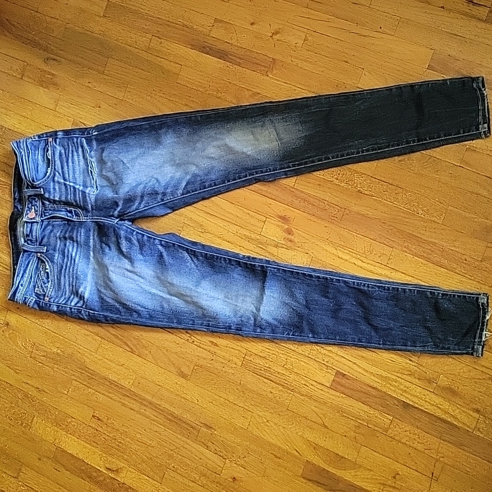 Buckle skinny jeans
